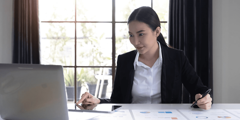 woman paying taxes